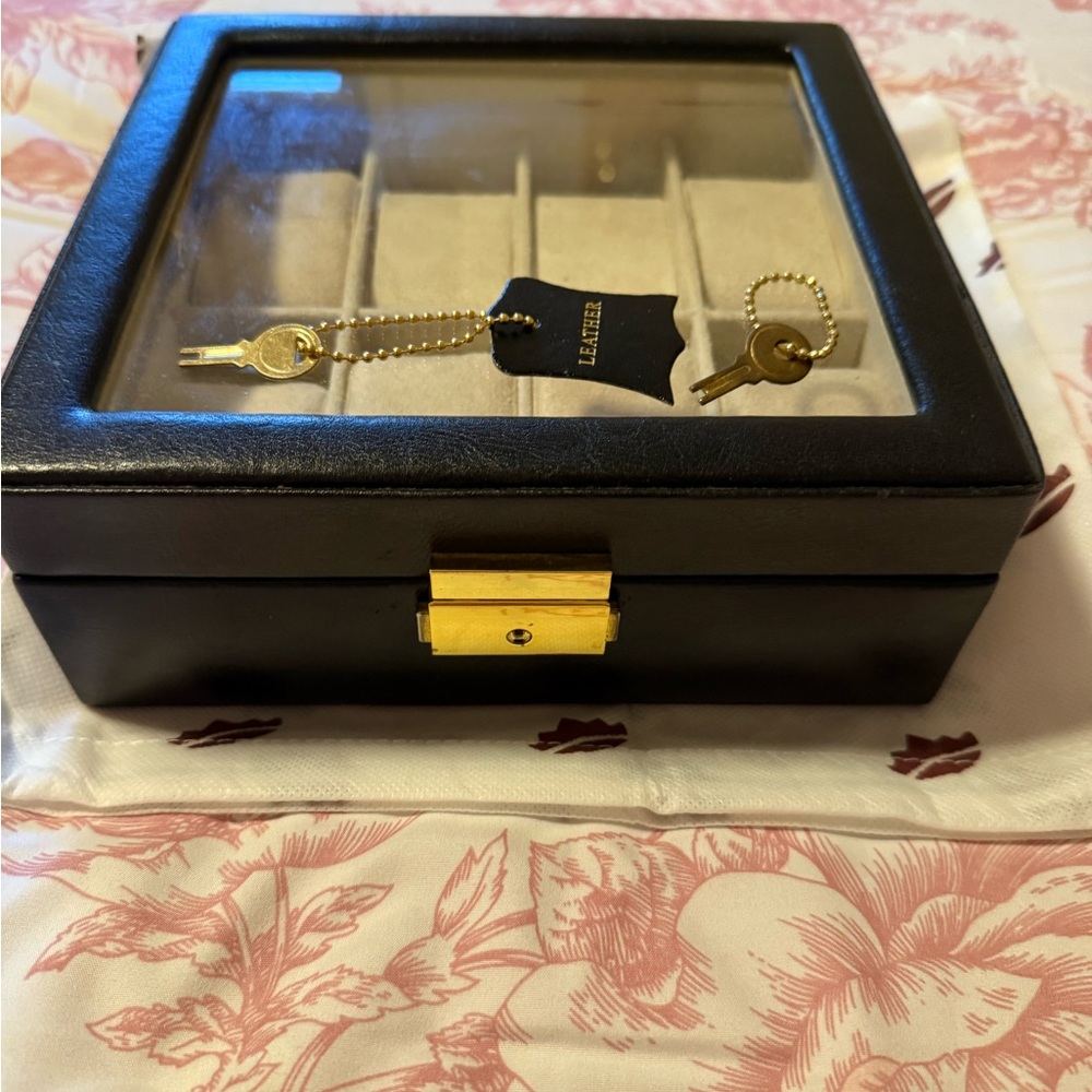 Black Leather watch Box with Gold Accents comes with dust bag and two keys